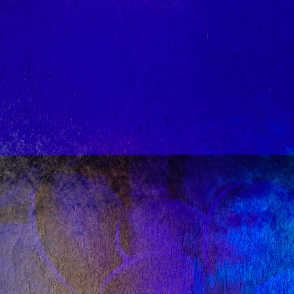 Caribbean Blue Transparent, Iridescent, rainbow Bullseye Glass